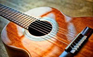 Read more about the article E Minor 7 Guitar Chord: 27 Guitar Chords For Em7